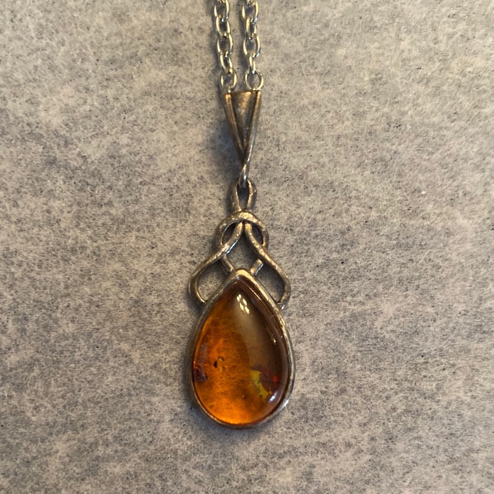 Amber pendant on silver chain